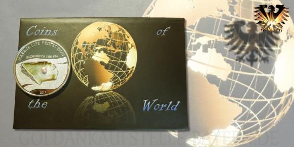 Umverpackung zur Motivmünze aus Palau von 2011. Oben steht: Coins of the World. Schöne Schatulle mit Magnetverschluß.